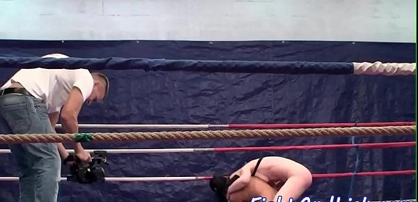  Athletic lesbians wrestling in a boxing ring